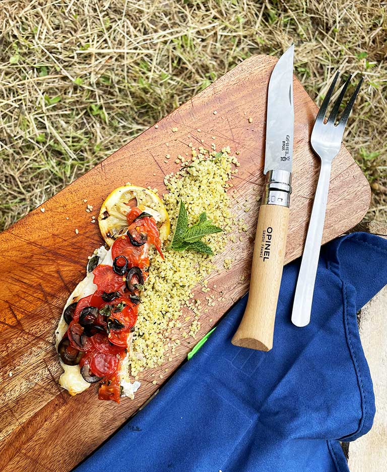 Sea bream with tomatoes and olives on the barbecue by Alexandre Hurson